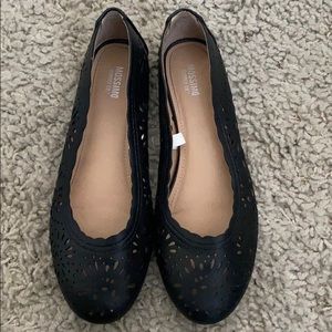 Black eyelet flats